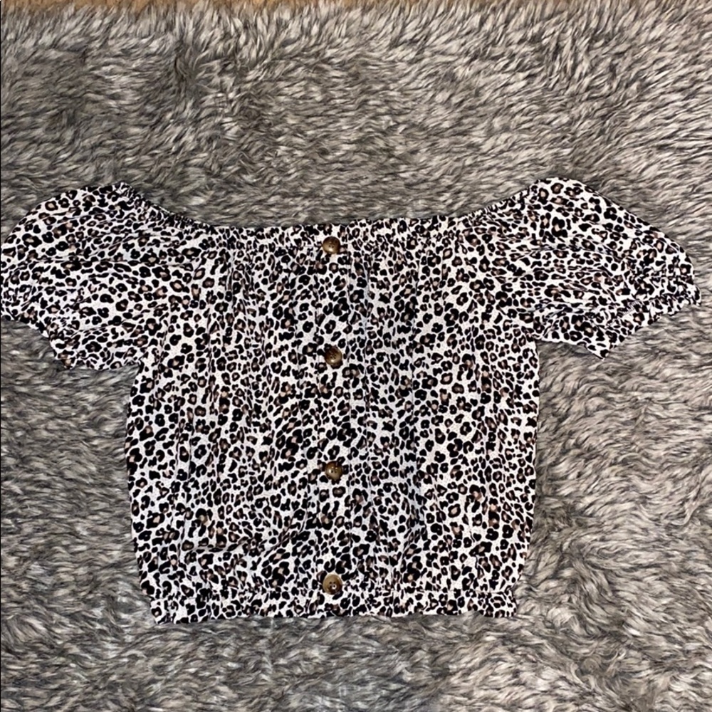 Women’s cheetah print off shoulder crop top